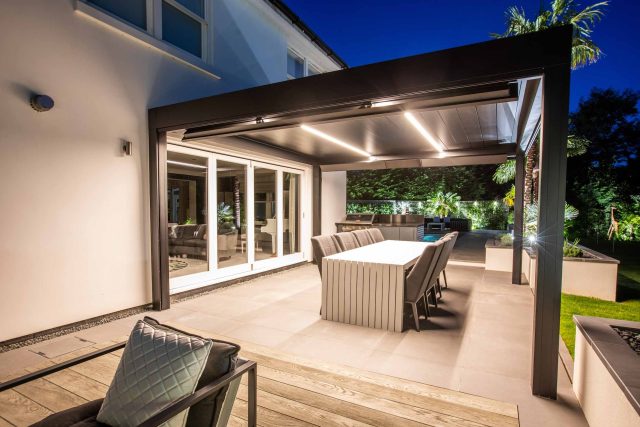 Oxshott Garden Designer Surrey stunning family garden with contemporary design, careful planting design was key to create the hidden feel to the pool designer.