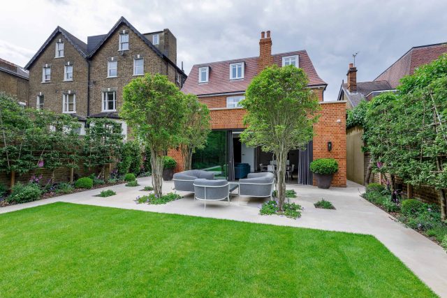 Beautiful contemporary family garden in Kew designed by Maitanne Hunt, constructed by The Garden Builders, creates a spacious, relaxing environment for entertain.