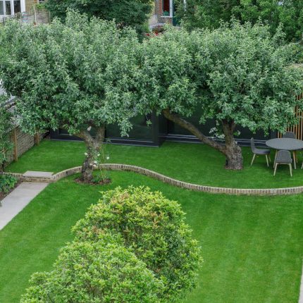 Beautiful contemporary family garden in Kew designed by Maitanne Hunt, constructed by The Garden Builders, creates a spacious, relaxing environment for entertain.