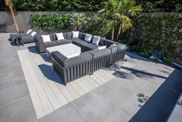 Oxshott Garden Designer Surrey stunning family garden with contemporary design, careful planting design was key to create the hidden feel to the pool designer.