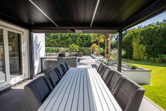 Oxshott Garden Designer Surrey stunning family garden with contemporary design, careful planting design was key to create the hidden feel to the pool designer.