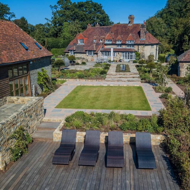 Petworth Garden Designer Sussex stunning countryside garden design York-stone sumptuous pathways house to the guest rooms importantly to the pool area & Croquet.