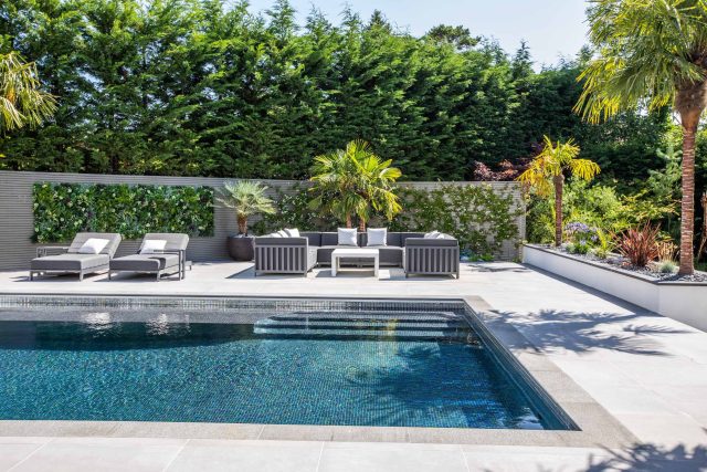 Oxshott Garden Designer Surrey stunning family garden with contemporary design, careful planting design was key to create the hidden feel to the pool designer.