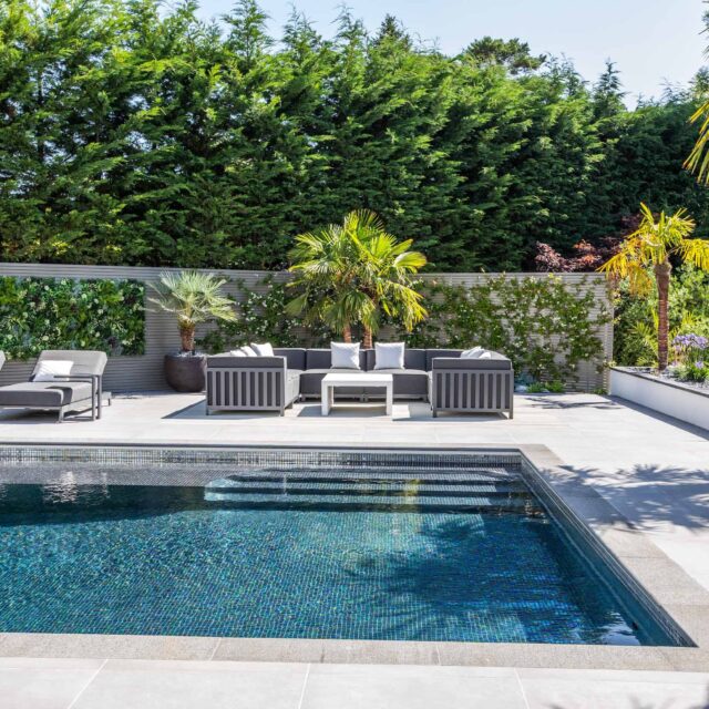 Oxshott Garden Designer Surrey stunning family garden with contemporary design, careful planting design was key to create the hidden feel to the pool designer.
