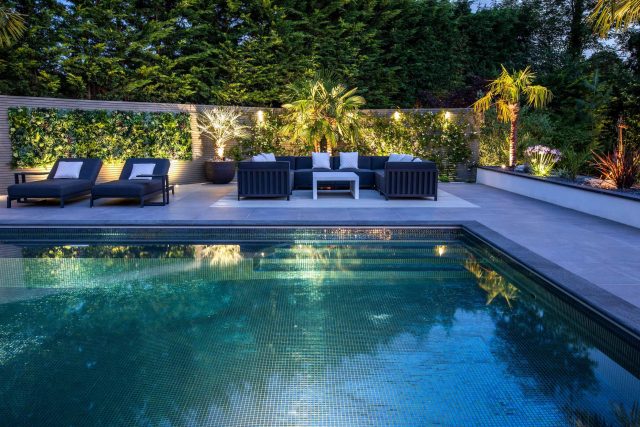 Oxshott Garden Designer Surrey stunning family garden with contemporary design, careful planting design was key to create the hidden feel to the pool designer.