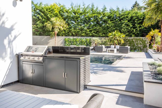 Oxshott Garden Designer Surrey stunning family garden with contemporary design, careful planting design was key to create the hidden feel to the pool designer.