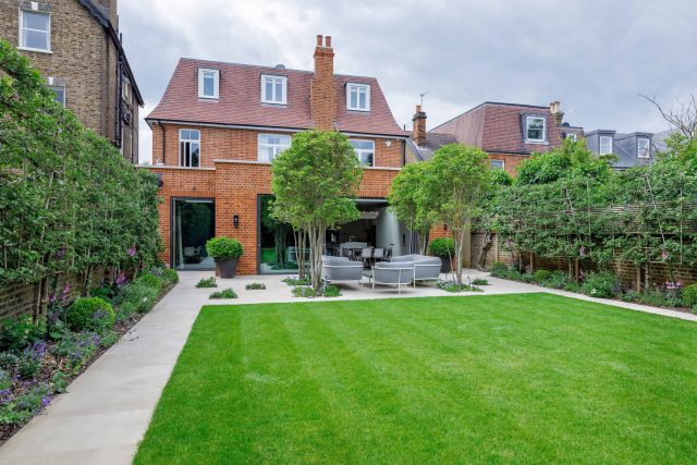 Beautiful contemporary family garden in Kew designed by Maitanne Hunt, constructed by The Garden Builders, creates a spacious, relaxing environment for entertain.