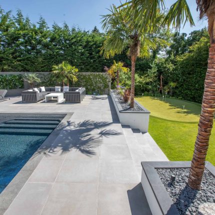 Oxshott Garden Designer Surrey stunning family garden with contemporary design, careful planting design was key to create the hidden feel to the pool designer.