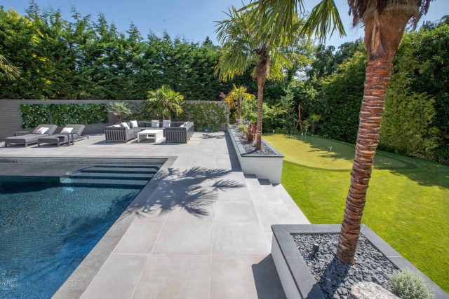 Oxshott Garden Designer Surrey stunning family garden with contemporary design, careful planting design was key to create the hidden feel to the pool designer.
