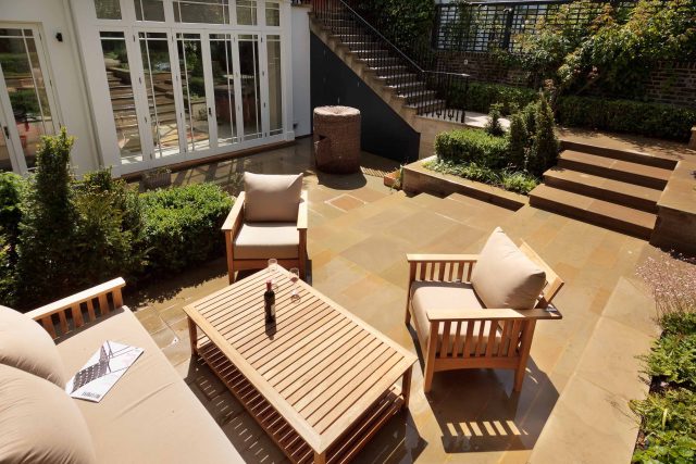 Large Grand Garden design includes York stone and wooden family pavilion in Notting Hill west London Landscape design company Ladbroke Grove Westbourne Grove.