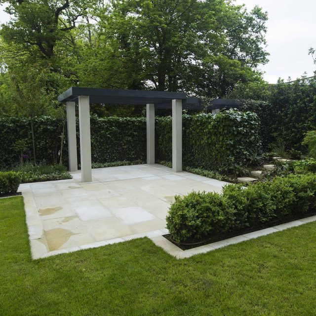 Contemporary landscaped large garden london with pre cast stone paving, led lighting and irrigation, elegant feature step, terrace and basement pool best design.