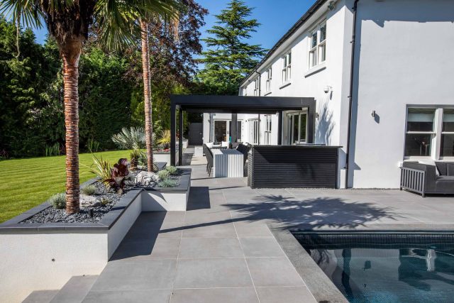 Oxshott Garden Designer Surrey stunning family garden with contemporary design, careful planting design was key to create the hidden feel to the pool designer.