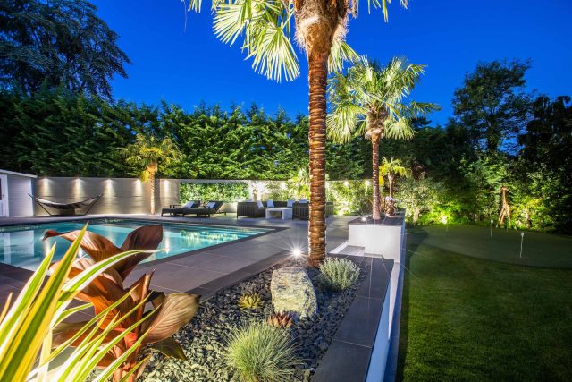 Oxshott Garden Designer Surrey stunning family garden with contemporary design, careful planting design was key to create the hidden feel to the pool designer.
