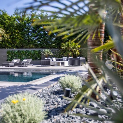 Oxshott Garden Designer Surrey stunning family garden with contemporary design, careful planting design was key to create the hidden feel to the pool designer.