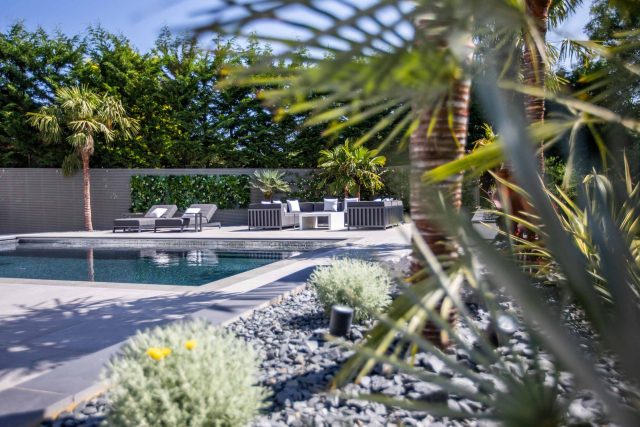 Oxshott Garden Designer Surrey stunning family garden with contemporary design, careful planting design was key to create the hidden feel to the pool designer.