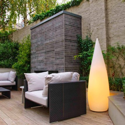 Large BBQ Outdoor dining area low maintenance Cambridge Place Town House by Kate Gould bi-fold doors installation, garden decking design specialist in London.