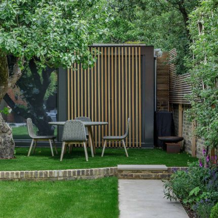 Beautiful contemporary family garden in Kew designed by Maitanne Hunt, constructed by The Garden Builders, creates a spacious, relaxing environment for entertain.