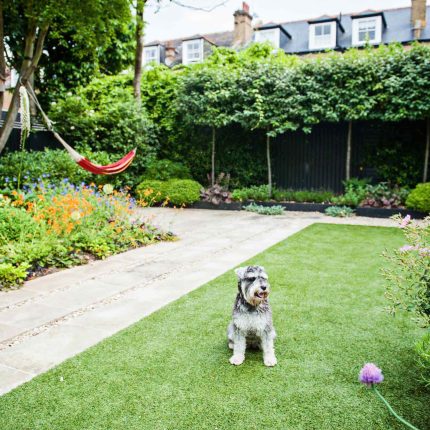Garden with Stone terrace pathways in Wandsworth designed by Sarah Hammond constructed by the Garden Builders, classical high quality finish and low maintenance.