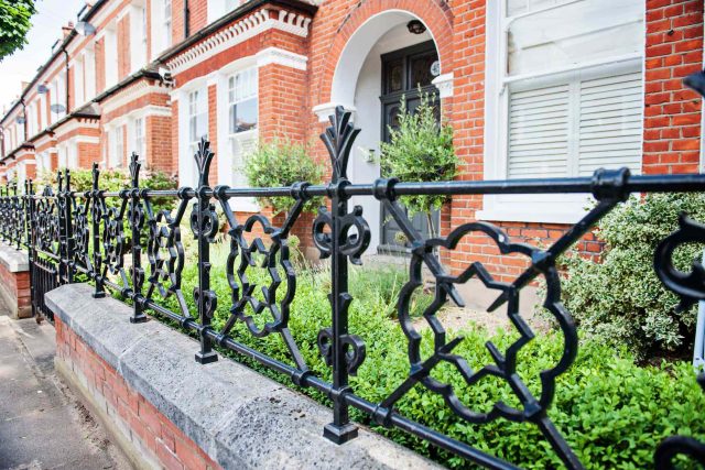 Garden with Stone terrace pathways in Wandsworth designed by Sarah Hammond constructed by the Garden Builders, classical high quality finish and low maintenance.