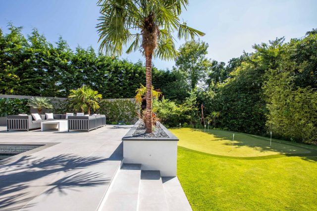 Oxshott Garden Designer Surrey stunning family garden with contemporary design, careful planting design was key to create the hidden feel to the pool designer.