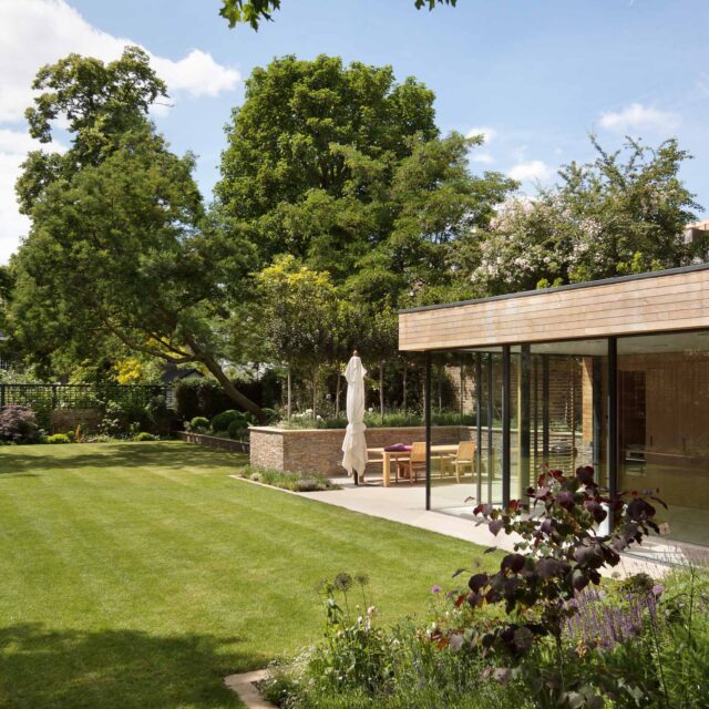 Large Grand Garden design includes York stone and wooden family pavilion in Notting Hill west London Landscape design company Ladbroke Grove Westbourne Grove.