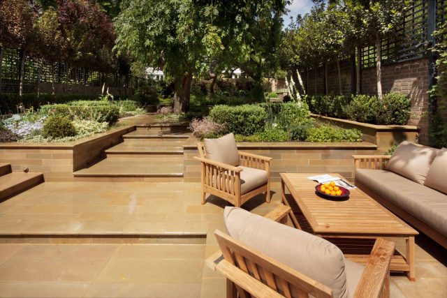 Large Grand Garden design includes York stone and wooden family pavilion in Notting Hill west London Landscape design company Ladbroke Grove Westbourne Grove.