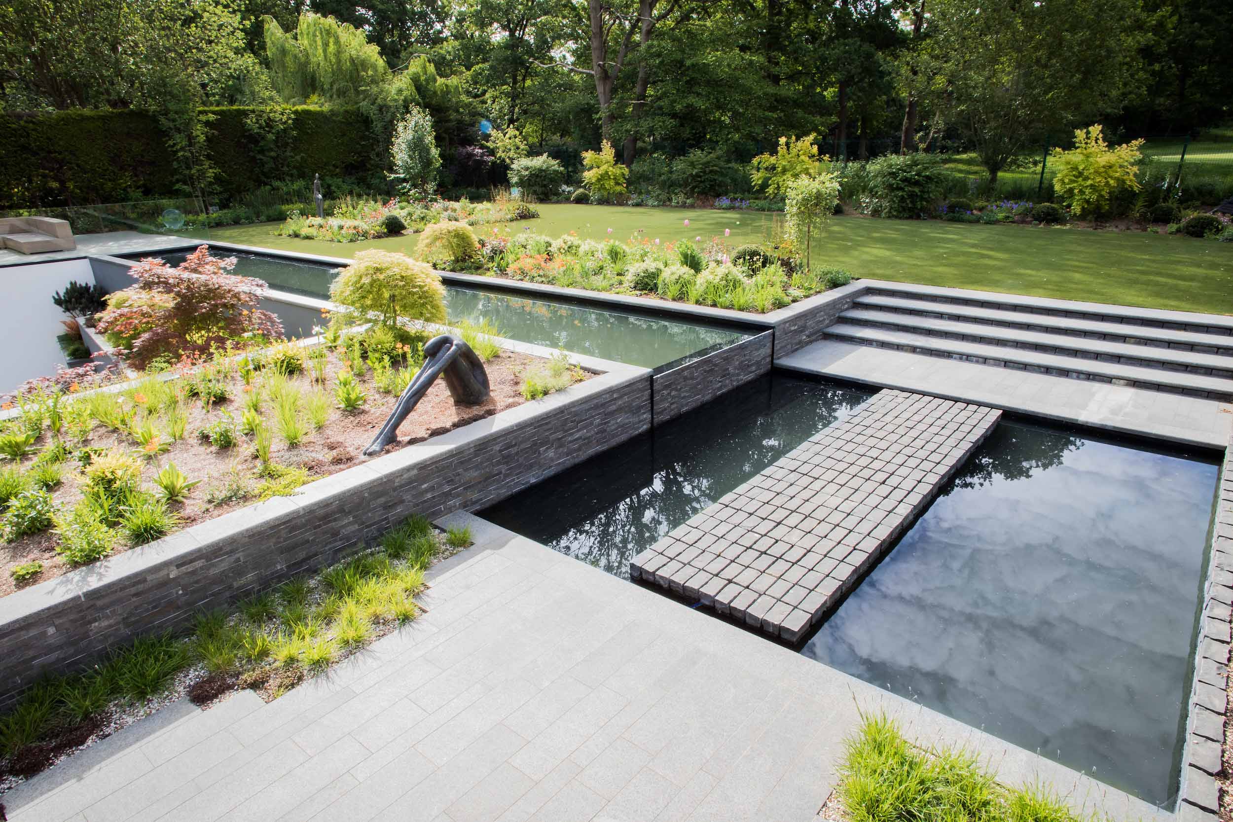Water Gardens designed and constructed by The Garden Builders best Landscape consultants creating amazing water gardens requires planning emphasis sustainability.
