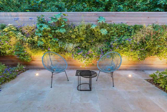Hardscaping design structure and contrast elements to the organic forms, and likewise provides continuity between the indoor and outdoor areas of the property.