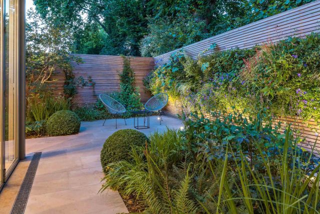 Hardscaping design structure and contrast elements to the organic forms, and likewise provides continuity between the indoor and outdoor areas of the property.