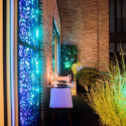 Roof terrace design Covent Garden composite decking luxurious entertaining in the heart of London with contemporary furniture a bio-fuel burning fire table.