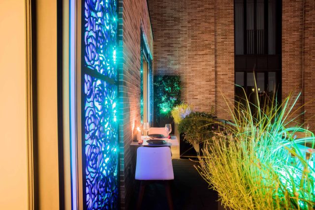Roof terrace design Covent Garden composite decking luxurious entertaining in the heart of London with contemporary furniture a bio-fuel burning fire table.