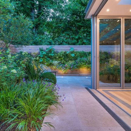 Hardscaping design structure and contrast elements to the organic forms, and likewise provides continuity between the indoor and outdoor areas of the property.