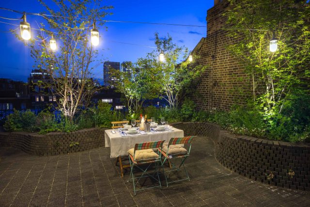 Marylebone London garden design by Todd Longstaff-Gowan and built by The Garden Buidlers brick patio drainage landscaping, planting with shrubs and climbers.