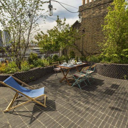 Marylebone London garden design by Todd Longstaff-Gowan and built by The Garden Buidlers brick patio drainage landscaping, planting with shrubs and climbers.