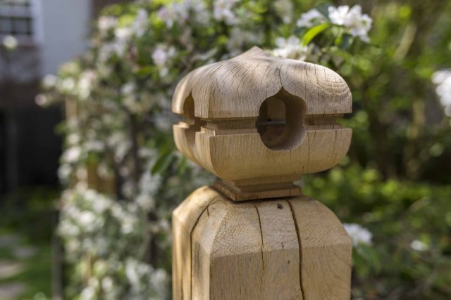Inspirational city garden design in Holland Park London, Yorkstone stepping stones, oak posts architectural rythm to utilise lower terrace, near the basement.