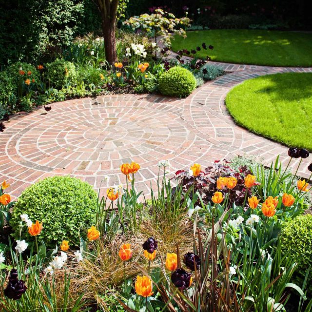 Hampstead Garden, planting design of evergreen lush structural plants and hedging, in-filled with seasonal perennials meticulous attention to correct planting.