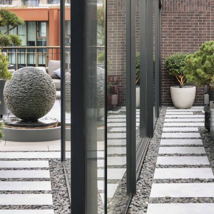 Roof Terrace Designer Mayfair, central London apartment, is arguably the most prestigious penthouse garden to echo the building and area, roof terrace design.