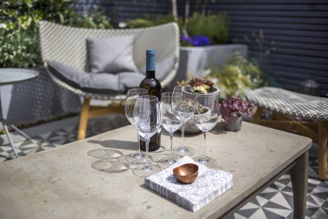 Private Small Garden Design ideas for this small south London courtyard garden evolved from the client's love of the hand made Italian tiles outdoor room ideas.