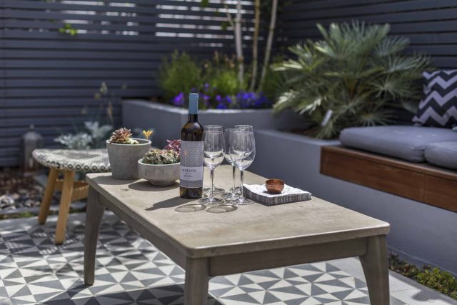 Private Small Garden Design ideas for this small south London courtyard garden evolved from the client's love of the hand made Italian tiles outdoor room ideas.