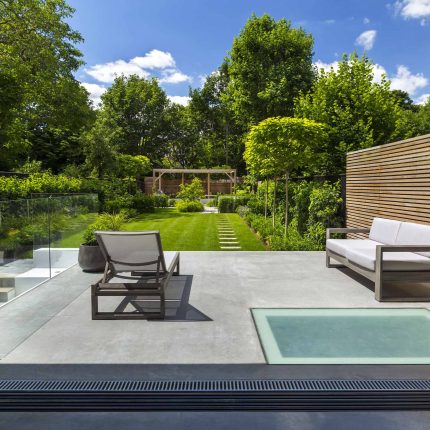Stunning Contemporary Garden, A generous polished concrete patio continues from inside to outside and steps down to sawn sandstone paving stones best design.
