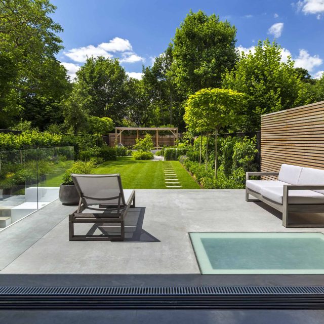 Stunning Contemporary Garden, A generous polished concrete patio continues from inside to outside and steps down to sawn sandstone paving stones best design.