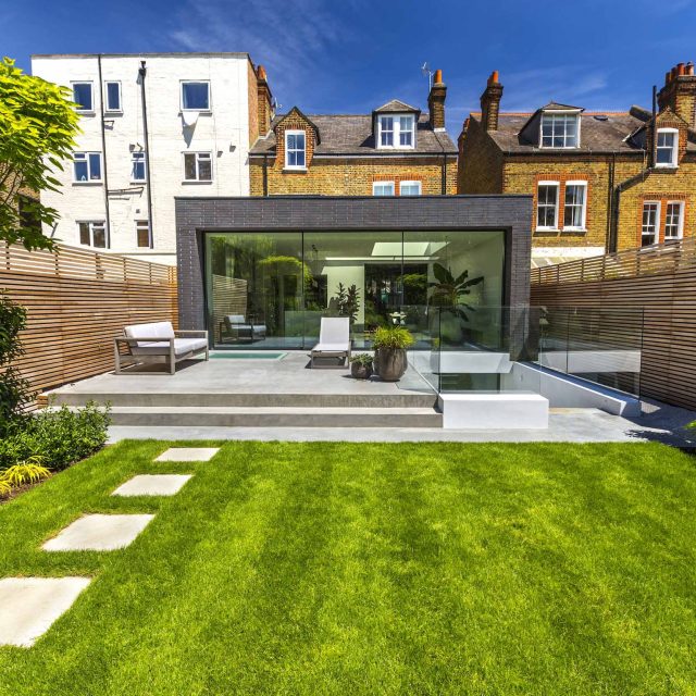 Stunning Contemporary Garden, A generous polished concrete patio continues from inside to outside and steps down to sawn sandstone paving stones best design.