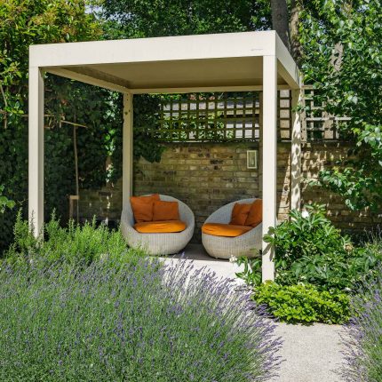 Elegant Family Garden design Tooting Bec contemporary style family friendly garden with kids play area, includes a variety of shrub and architectural planting.