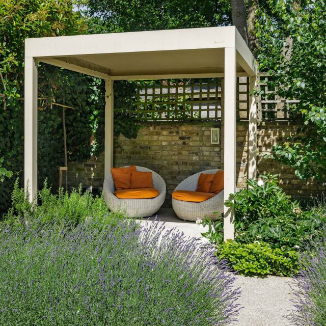 Elegant Family Garden design Tooting Bec contemporary style family friendly garden with kids play area, includes a variety of shrub and architectural planting.