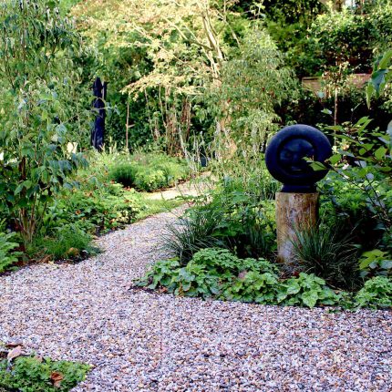 Garden Design Golders Green Strict, linear geometry gives way to a gently curving, hoggin path around the house vibrant relaxing space designed by Lynne Marcus.
