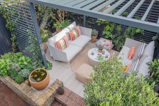 Greenwich Charlton Garden Design by The Garden Builders, outdoor lighting, Pergola structure, roof terrace building company in London top rated, Garden Room.