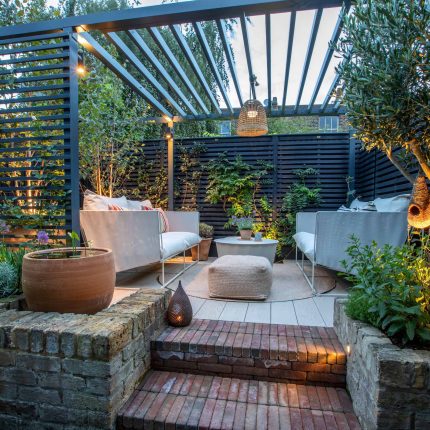 Greenwich Charlton Garden Design by The Garden Builders, outdoor lighting, Pergola structure, roof terrace building company in London top rated, Garden Room.
