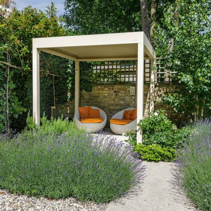 Elegant Family Garden design Tooting Bec contemporary style family friendly garden with kids play area, includes a variety of shrub and architectural planting.