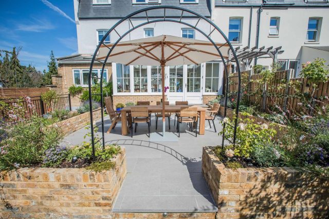 Garden Design Merton South West London Garden Designer Landscape Contractor, complimentary small city garden planting scheme also consisted of roses easigrass.
