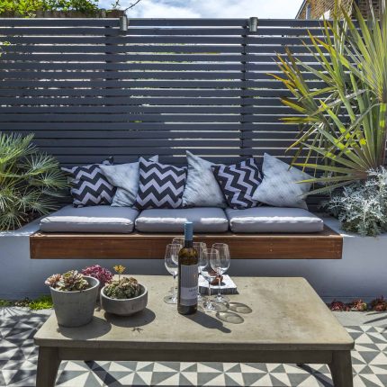 Private Small Garden Design ideas for this small south London courtyard garden evolved from the client's love of the hand made Italian tiles outdoor room ideas.